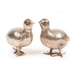 A pair of Continental silver novelty cruets modelled as quail,
