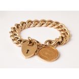 A 9ct gold bracelet with padlock clasp and a 1910 gold sovereign mounted in a pendant,