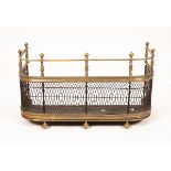 A 19th Century wirework deep section fire kerb, with brass top rail, 67cm wide, 30cm deep,