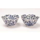 Early 20th Century Chinese porcelain petal-rimmed bowls with overglaze blue trailing leaves and