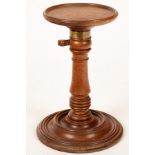 An early 19th Century mahogany adjustable candle stand,