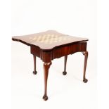 A George II style mahogany games and work table, rectangular with rounded corners,