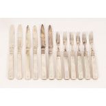 A set of six Edwardian silver fruit knives and forks, James Deakin & Sons, Sheffield 1901,