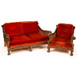 A Bergere suite comprising one sofa and three matching armchairs, upholstered in orange, 78.
