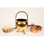 A 19th Century copper and brass bed warmer with a long turned wood handle, 107cm long,