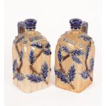 A pair of Bailey Fulham pottery stoneware decanters of square section,