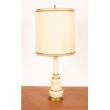 An opaque cream glass table lamp, of column form,
