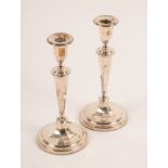 A pair of Adam style silver candlesticks, Sheffield 1911,