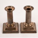 A pair of late Victorian silver desk candlesticks, Hawkesworth, Eyre & Co.