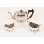 An Edwardian three piece silver tea service, John Henry Potter, Sheffield 1907,