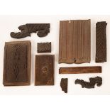 A quantity of carved oak panels, to include two linen fold panels,
