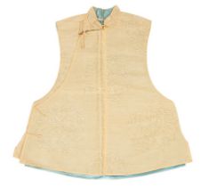 A Chinese civil officer's ivory brocade silk waistcoat,