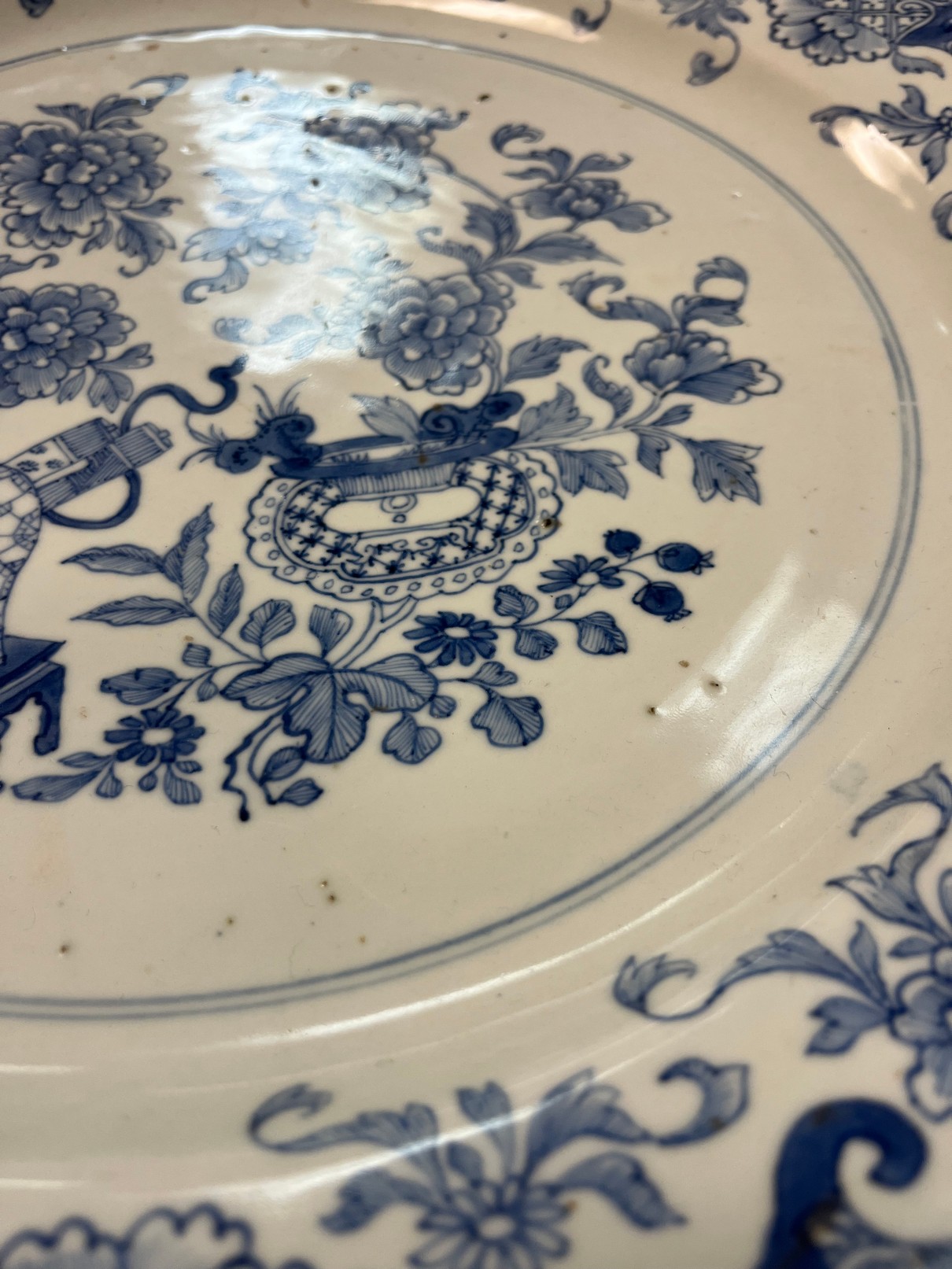 A Chinese blue and white charger, Qing dynasty, typically decorated with vase and flowers, - Image 6 of 7
