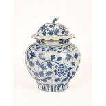 A Chinese blue and white ginger jar of baluster form decorated a band of trailing foliage, 25.