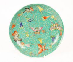 A Chinese plate decorated butterflies,