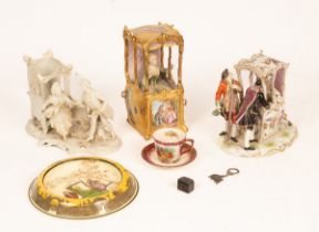 Three 20th Century Continental porcelain models of sedan chairs,