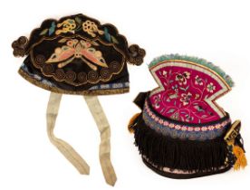 A child's Chinese hat, decorated with gold and a butterfly,