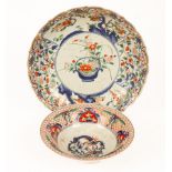 A Japanese Imari dish, Meiji period, painted with panels of flowers, 35.