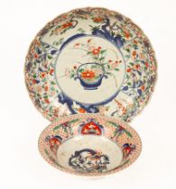 A Japanese Imari dish, Meiji period, painted with panels of flowers, 35.