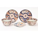 A pair of Japanese Imari bowls and matching dishes, Edo period, 17th/18th Century,