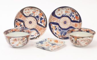 A pair of Japanese Imari bowls and matching dishes, Edo period, 17th/18th Century,