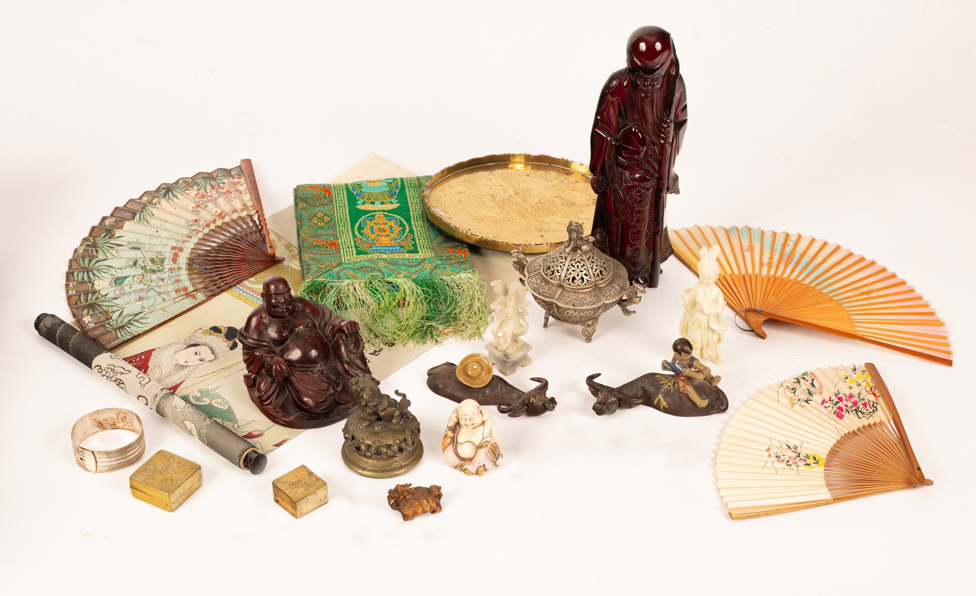 A group of Oriental items to include a Shoulao statue, two laughing Buddha statues,