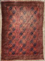 An Ersari carpet, late 19th Century, the brick red field of elephant foot guls,