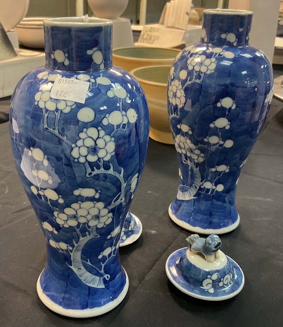 A pair of 20th Century Chinese blue and white bulbous vases and covers, decorated prunus, - Image 5 of 5
