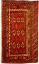 A Tekke chuval, West Turkestan, circa 1930, the burgundy field of three rows of three guls,