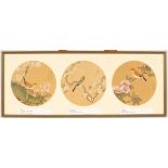 A set of three framed pictures, each of three panels within a frame,