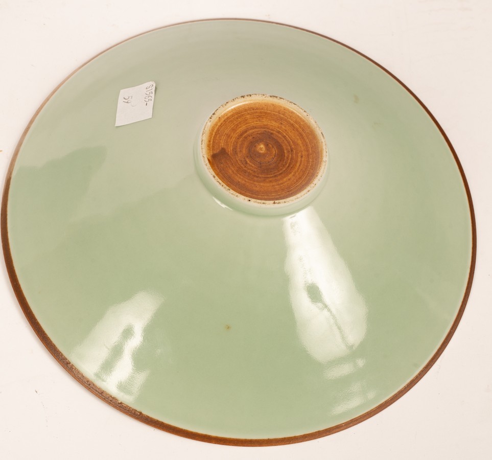 A Chinese celadon dish with incised decoration, - Image 2 of 3