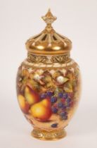 A large Royal Worcester pot-pourri vase and cover, painted by Freeman with pears and blackberries,