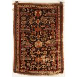 A Perepedil rug, South Caucasus, circa 1910, the deep abrashed indigo and charcoal field,