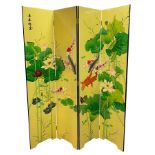 A 20th Century Chinese lacquered screen, decorated with carp and lilies on a gold background,