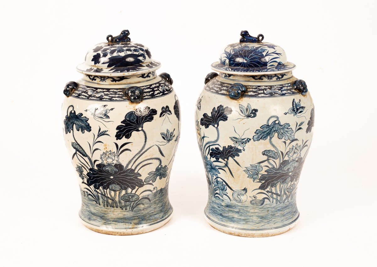 A pair of Chinese blue and white baluster jars and covers,