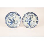 A pair of early 19th Century blue and white Chinese saucer dishes,