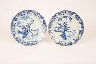 A pair of early 19th Century blue and white Chinese saucer dishes,