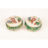 Pair of Chinese porcelain boxes, 19th Century, circular decorated with figures and leaves, 8.