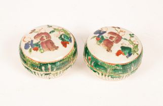 Pair of Chinese porcelain boxes, 19th Century, circular decorated with figures and leaves, 8.