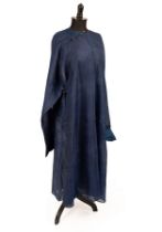 A gentleman's Chinese blue surcoat with circular cartouche decoration,