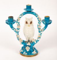 A Minton porcelain three-light candlestick, circa 1860,