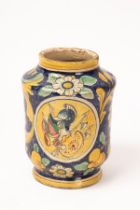 An Italian polychrome maiolica albarello, in the style of 16th Century Venice,