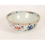 A Chinese bowl, 18th Century, painted in underglaze blue decorated with peonies and phoenix, 22.