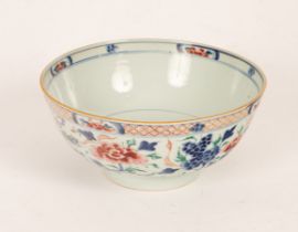 A Chinese bowl, 18th Century, painted in underglaze blue decorated with peonies and phoenix, 22.