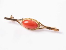 An 18ct gold and coral brooch