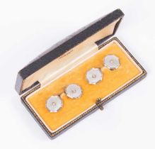 A pair of mother-of-pearl and diamond cufflinks