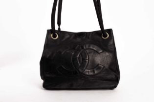 A Chanel black leather tote bag