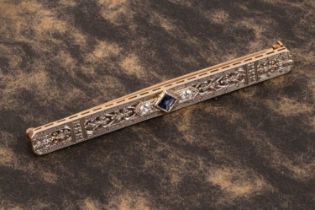 An Edwardian style 14k yellow and white gold sapphire and diamond bar brooch