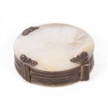 An 18th Century mother-of-pearl cased magnifying glass