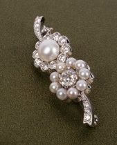 An 18ct white gold diamond and pearl brooch